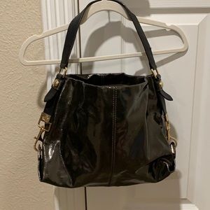 Patent leather brown purse.